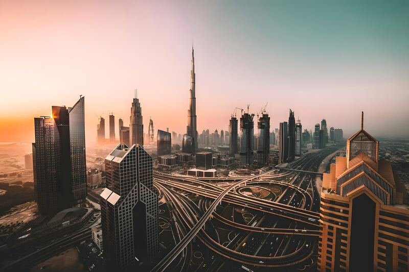 Sheikh Zayed Road and Downtown Dubai skyline with Burj Khalifa at dusk